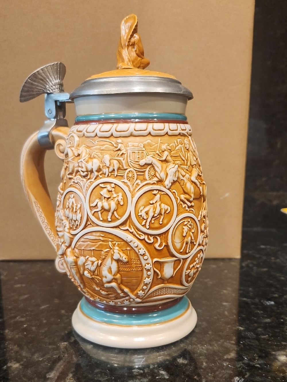 Avon Tan and Turquoise Relief Ceramic Beer Stein